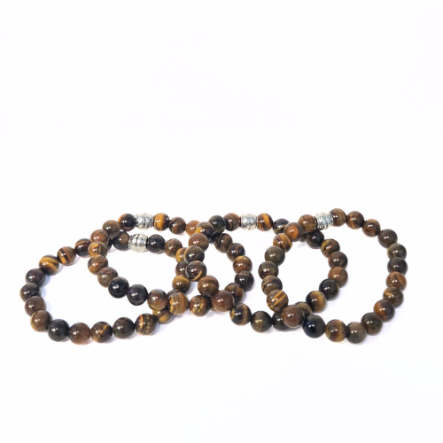 Tiger Eye gemstone bracelet close-up — golden chatoyant crystal bead bracelet for women