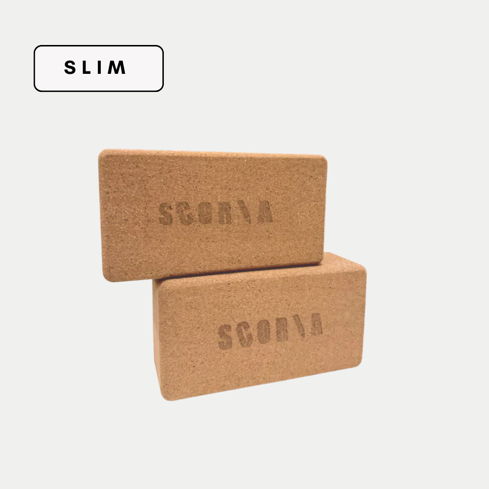 Two slim Cork Yoga Block 3x4.5x8.5 inches stacked on top of each other