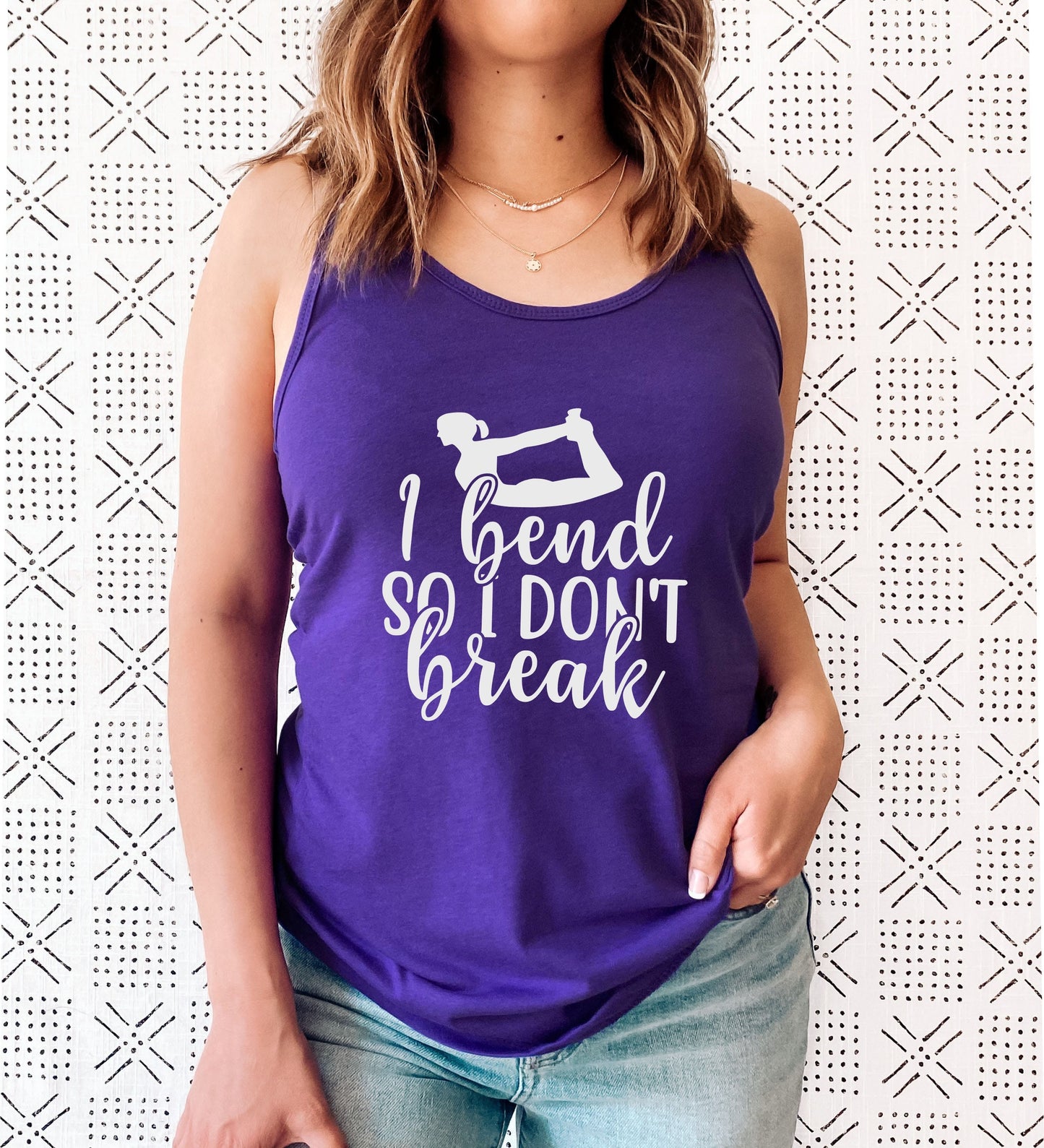 Resilient yoga racerback tank top for women who bend but never break in purple