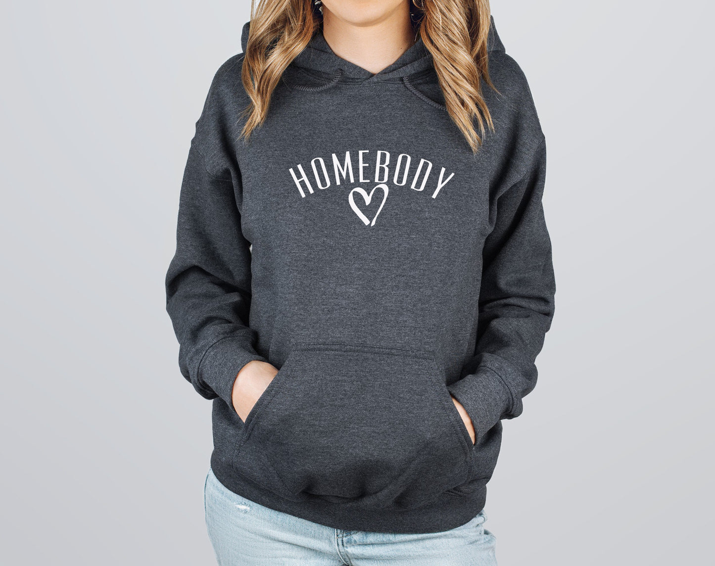 Cozy and relatable "Homebody" pullover hoodie for stay-at-home loving women in grey