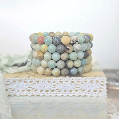 Amazonite gemstone bracelet close-up — flower pattern teal stone bracelet for women