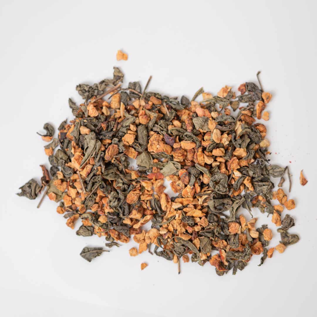 Close-up of apple peel and green tea leaves — fruity herbal blend by Rayhana
