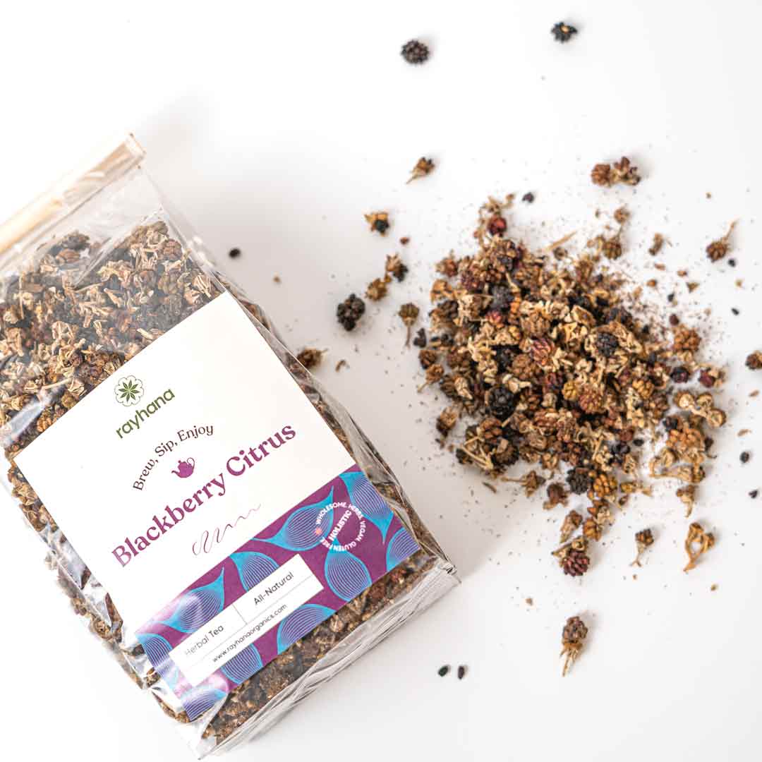 Close-up of dried blackberry and citrus blossoms — fruity loose leaf herbal blend