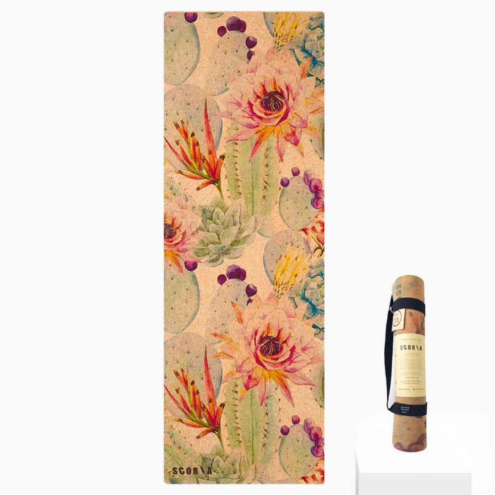 Yoga mat with cactus and flower design and carrying strap on a white background