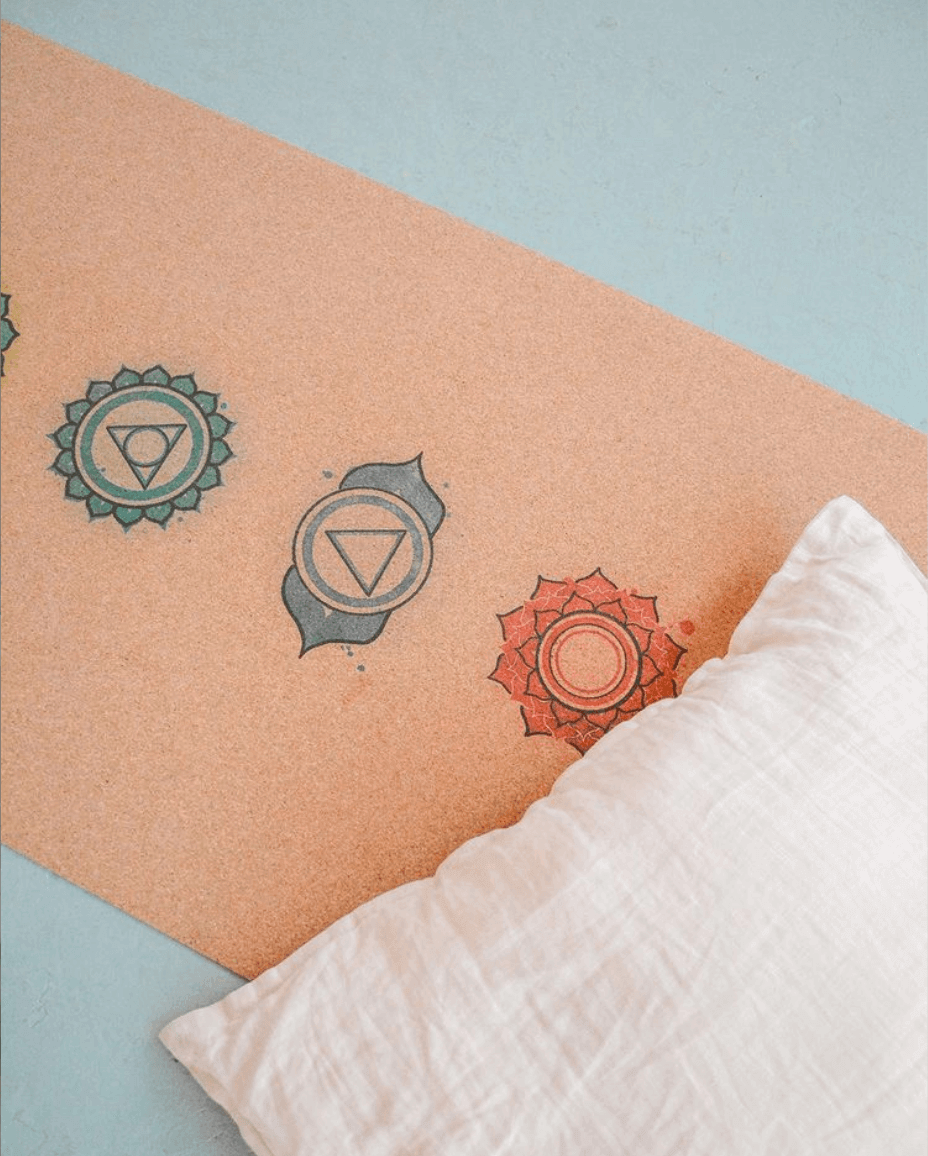 Cork yoga mat with chakra symbols