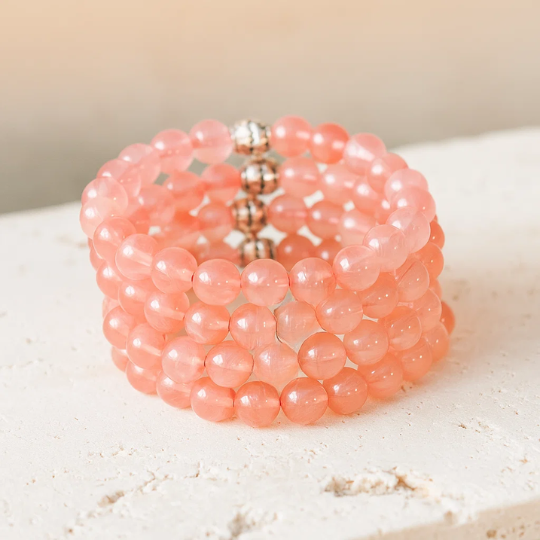 Cherry Quartz bracelet with swirling pink bead patterns — unique handcrafted crystal bracelet