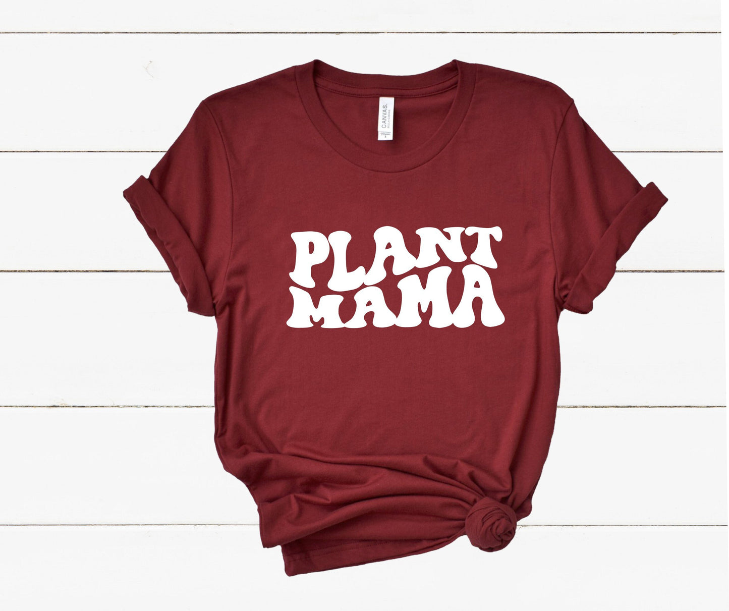 Plant Mama t-shirt close-up showing soft fabric and graphic print detail in cardinal red