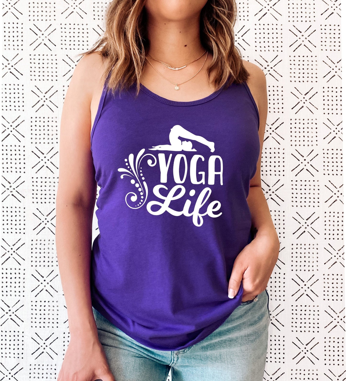 Yoga Life tank top close-up showing soft fabric and graphic print detail in purple