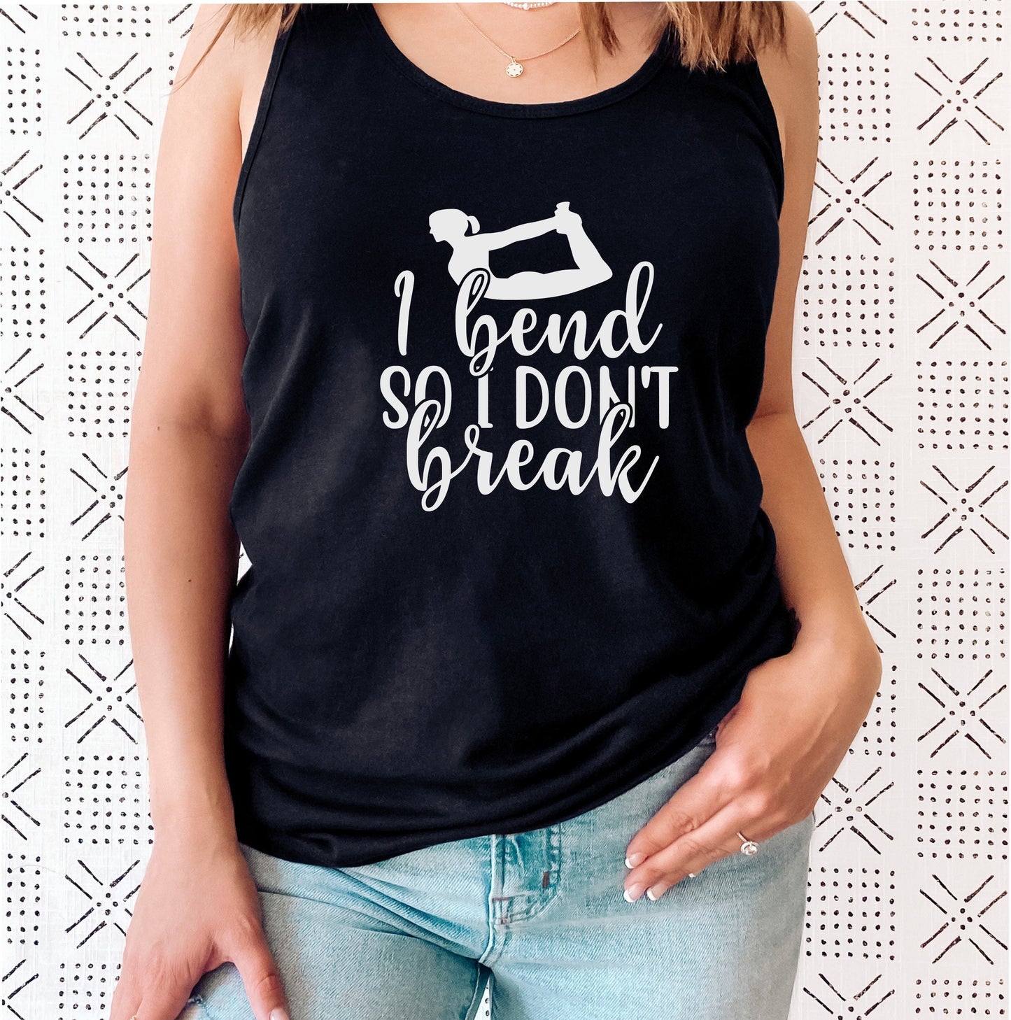 Strong and flexible women's yoga tank top as a perfect gift for yogis in black