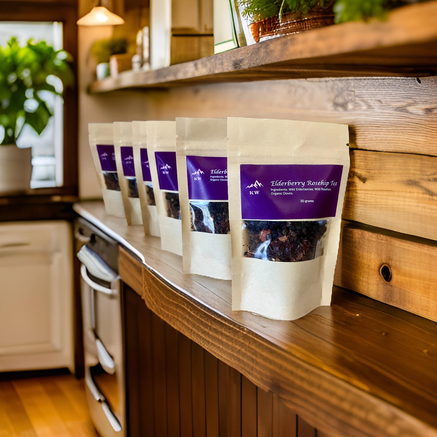 Row of Tiberberry Rooibos Tea packages on a wooden kitchen counter.