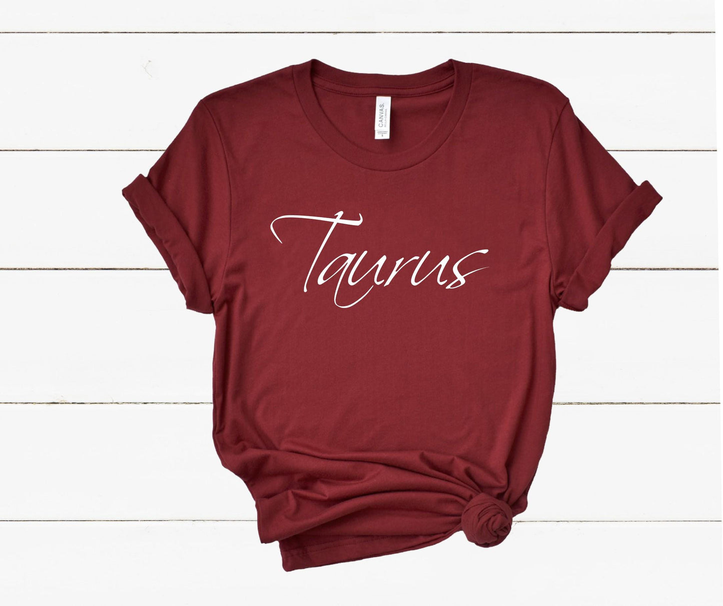 Proud Taurus women's astrology t-shirt for zodiac lovers and star sign fans in dark red