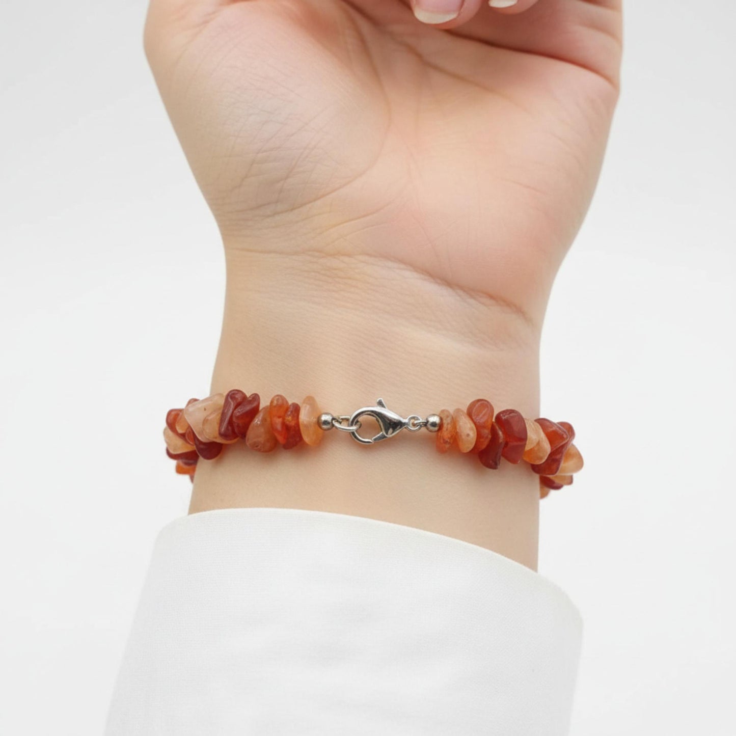 Raw Carnelian healing bracelet — natural orange gemstone chips for bold action, confidence, and Sacral Chakra activation
