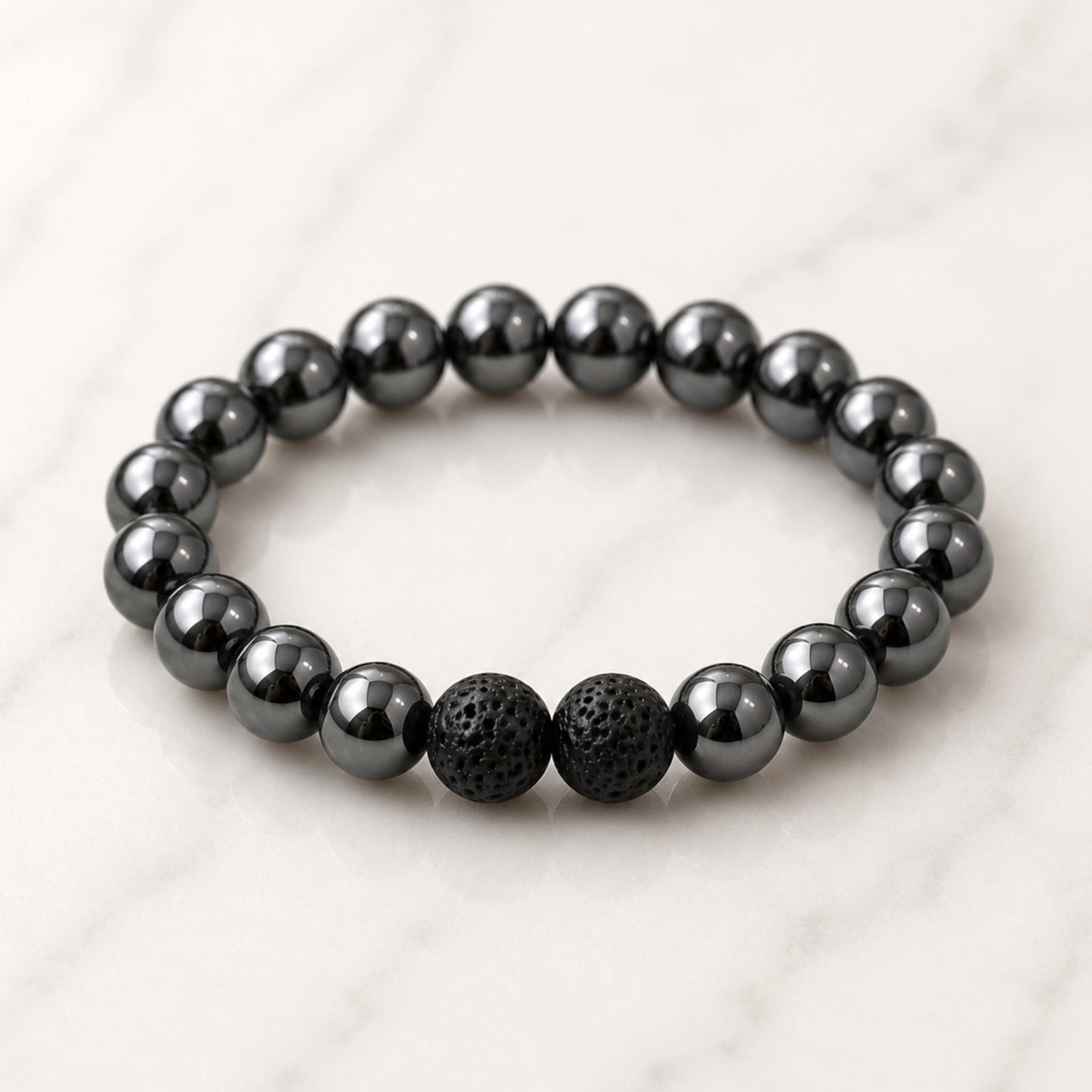 Lava stone essential oil diffuser bracelet with hematite — aromatherapy crystal jewelry for mindfulness and calm