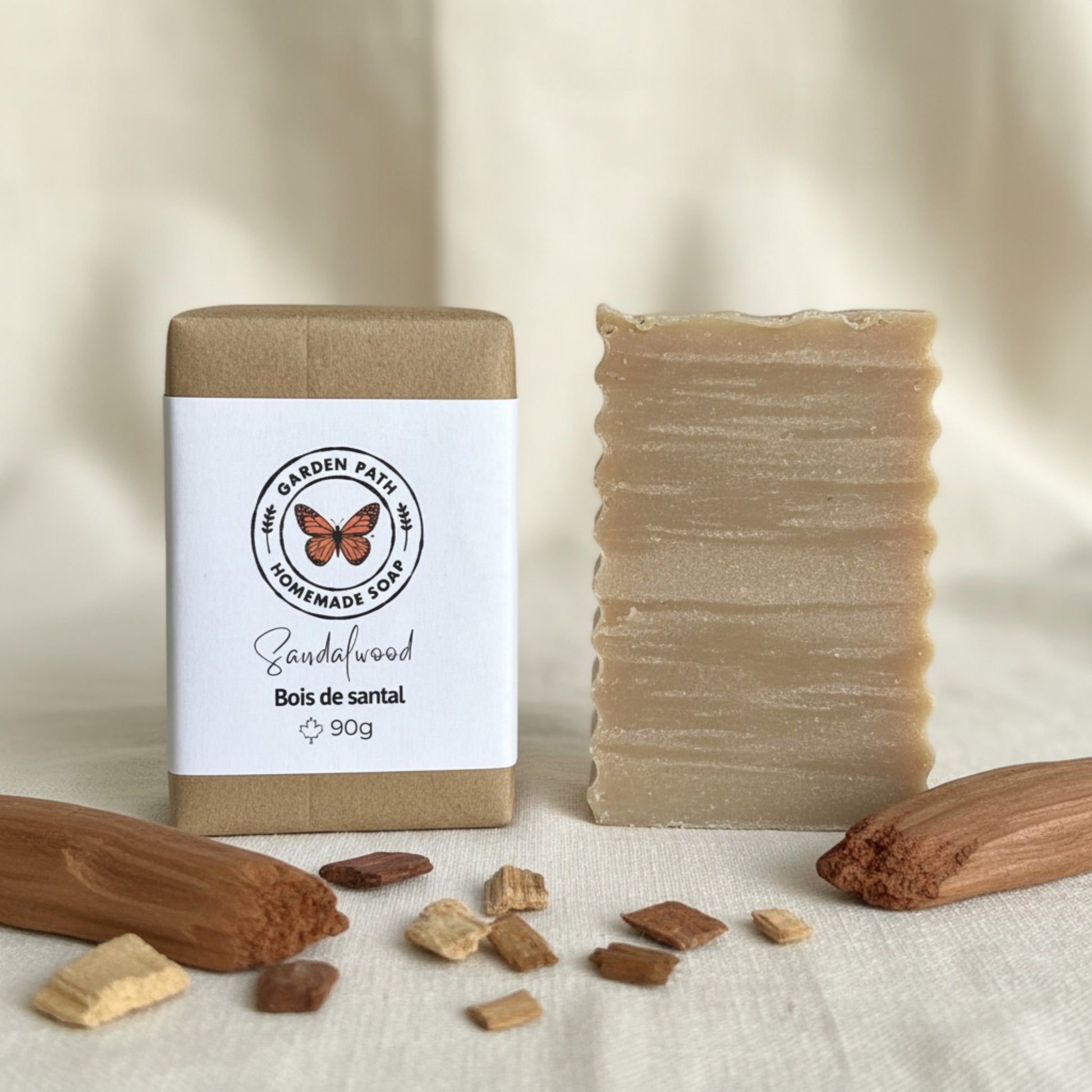 All natural sandalwood soap bar — small batch handmade soap gift for him, warm woody artisan soap Canada lightly decorated scene with sandal wood 