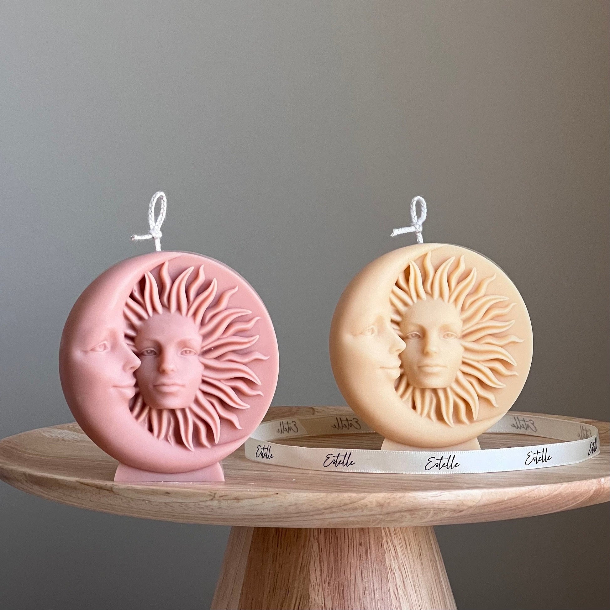 Sun and moon soy pillar candle in two colors on display