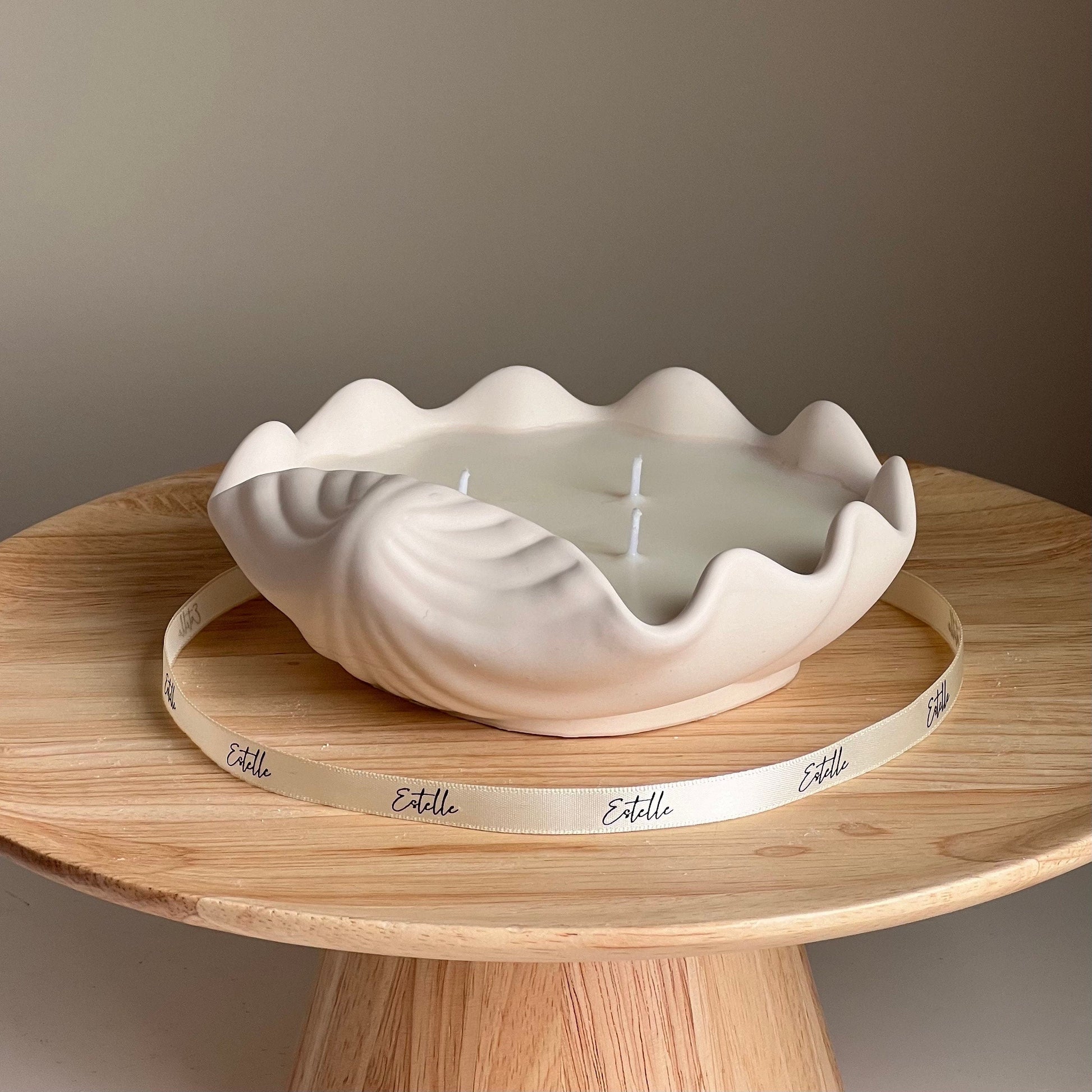 Handmade clam shell soy candle jesmonite vessel top view