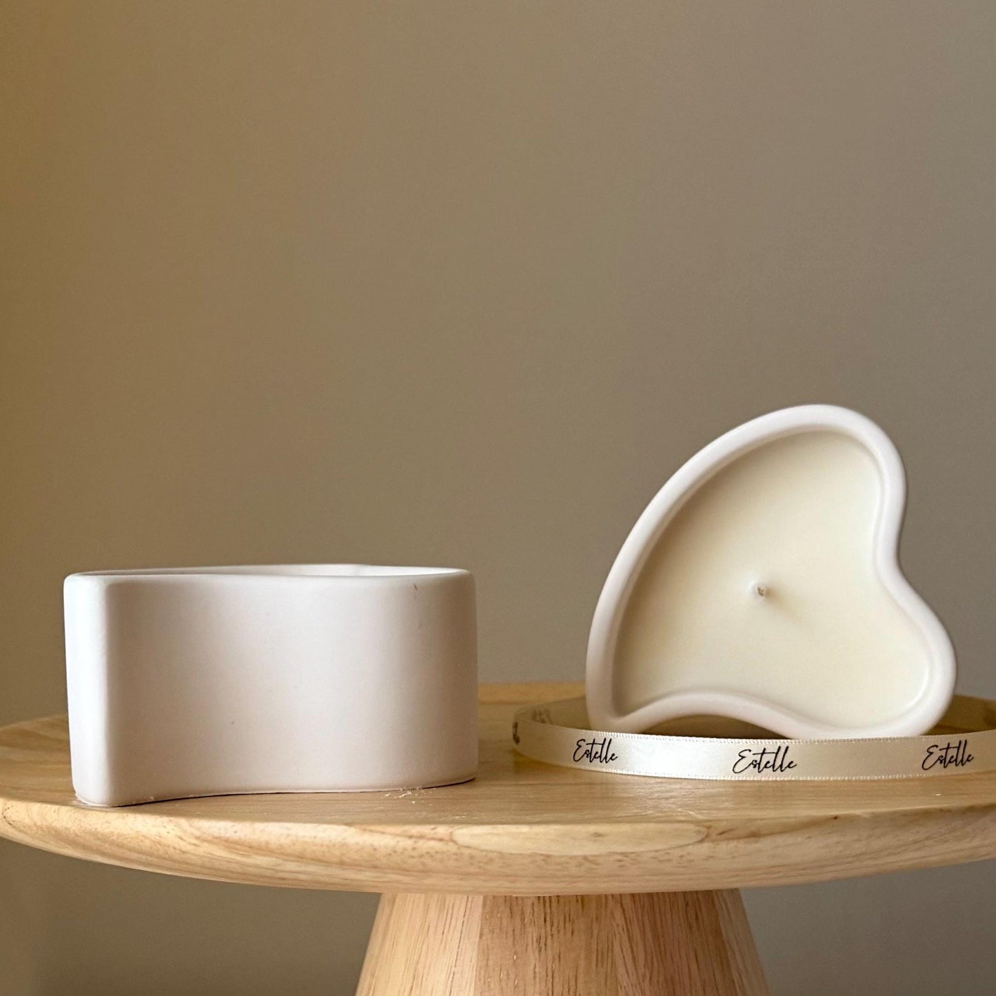 Heart shaped jesmonite candle vessel lifestyle shot