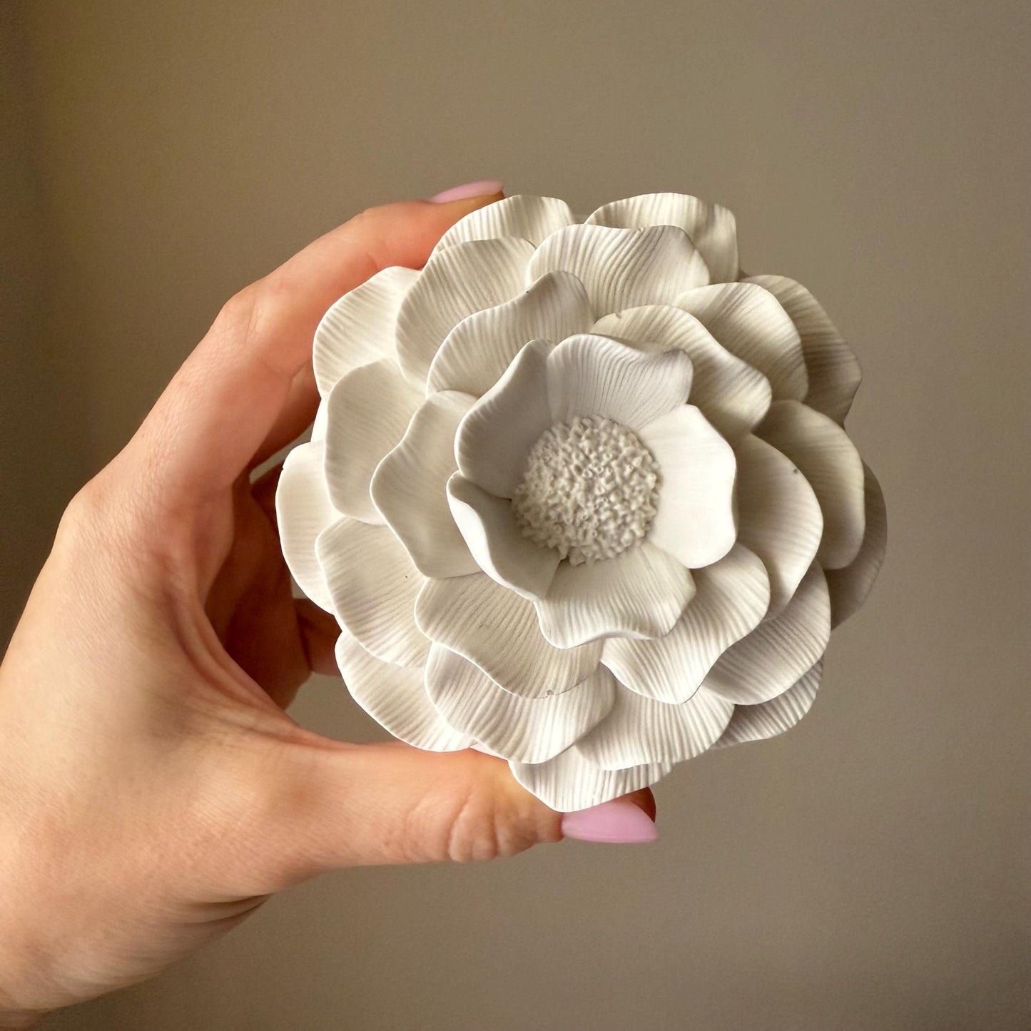 Handmade camelia soy candle jesmonite vessel top view