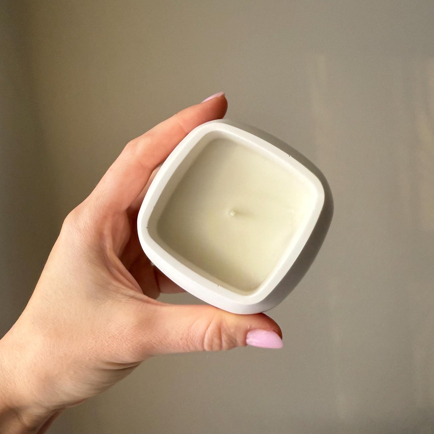 Handmade squircle soy candle jesmonite vessel top view