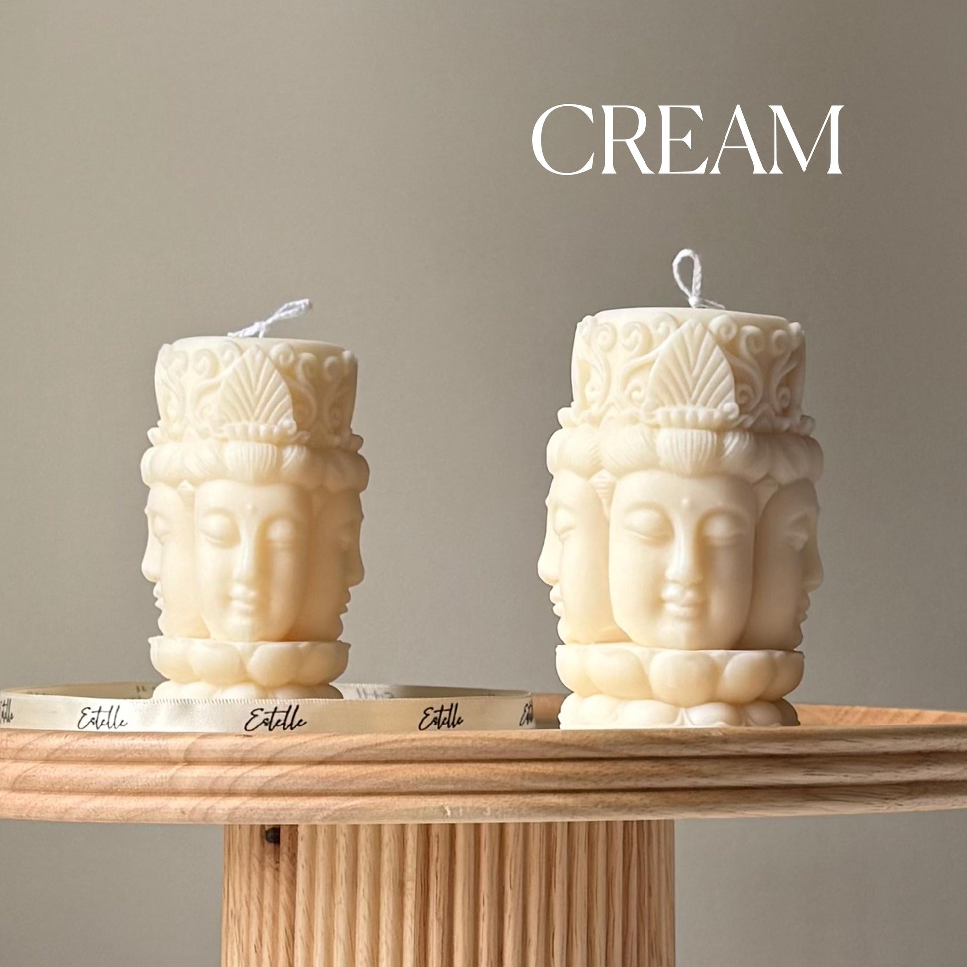 Buddha face soy pillar candle in cream
