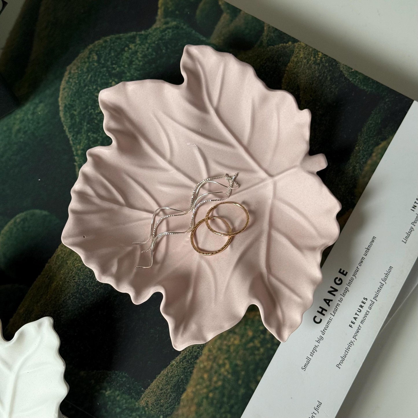 Jesmonite maple leaf trinket tray styled with jewelry