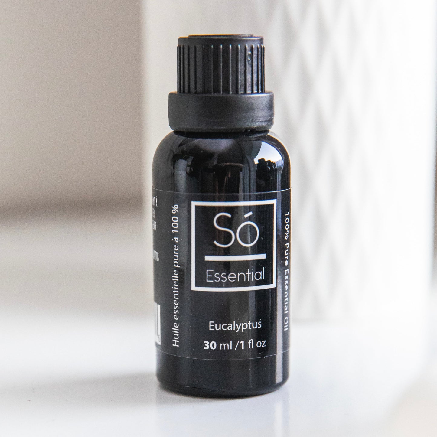 Black Eucalyptus essential oil bottle labeled 'Sö Essential' on a white background