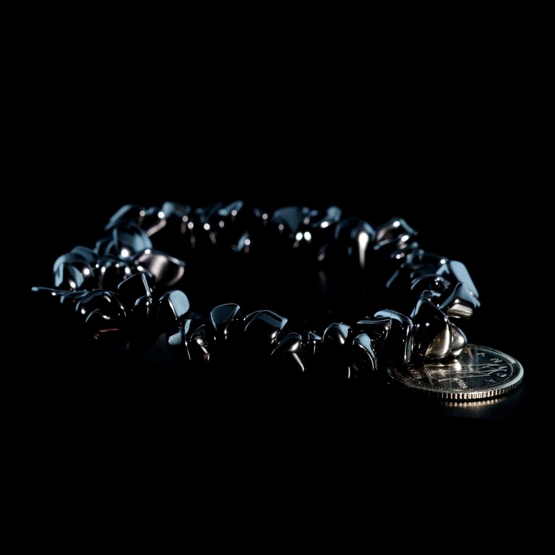 Hematite crystal bracelet worn on wrist for grounding and protection