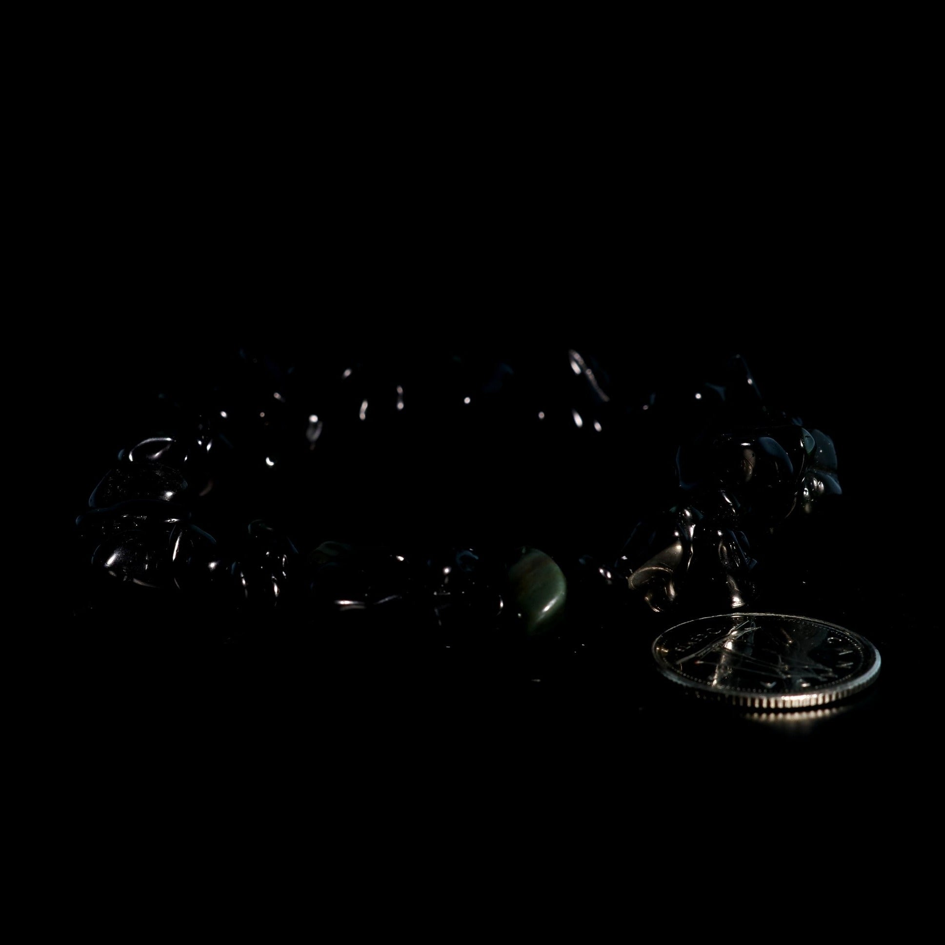 Deep black obsidian healing bracelet for strength and protection