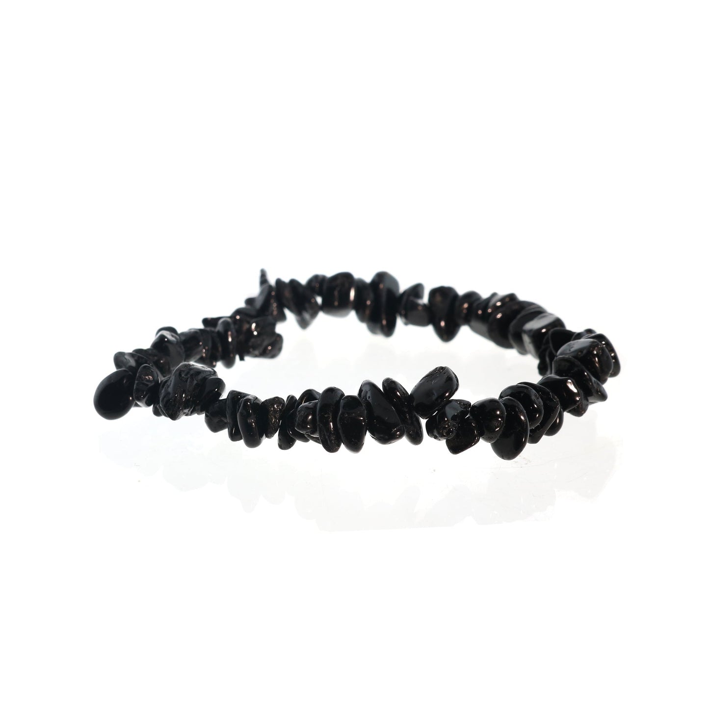 Black tourmaline bracelet close-up showing natural striated black crystal