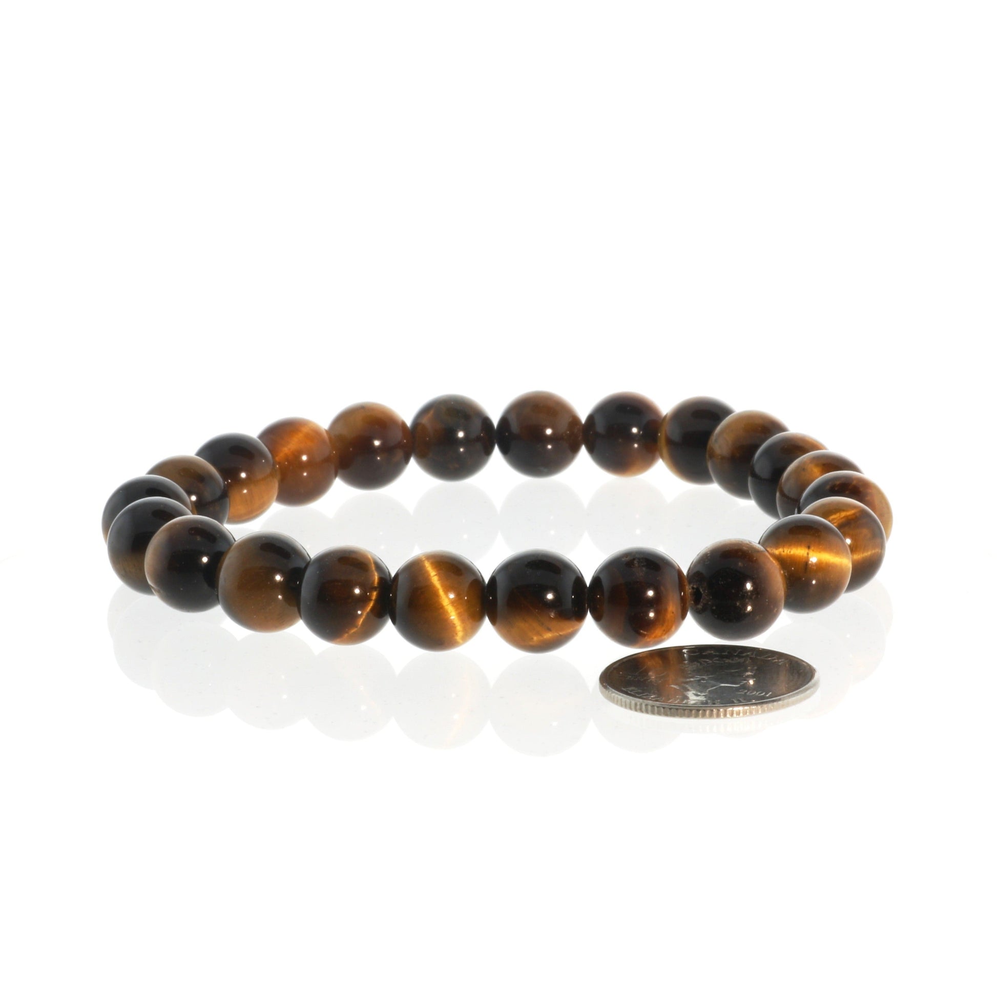 Gold tiger's eye bracelet close-up showing natural golden chatoyant shimmer