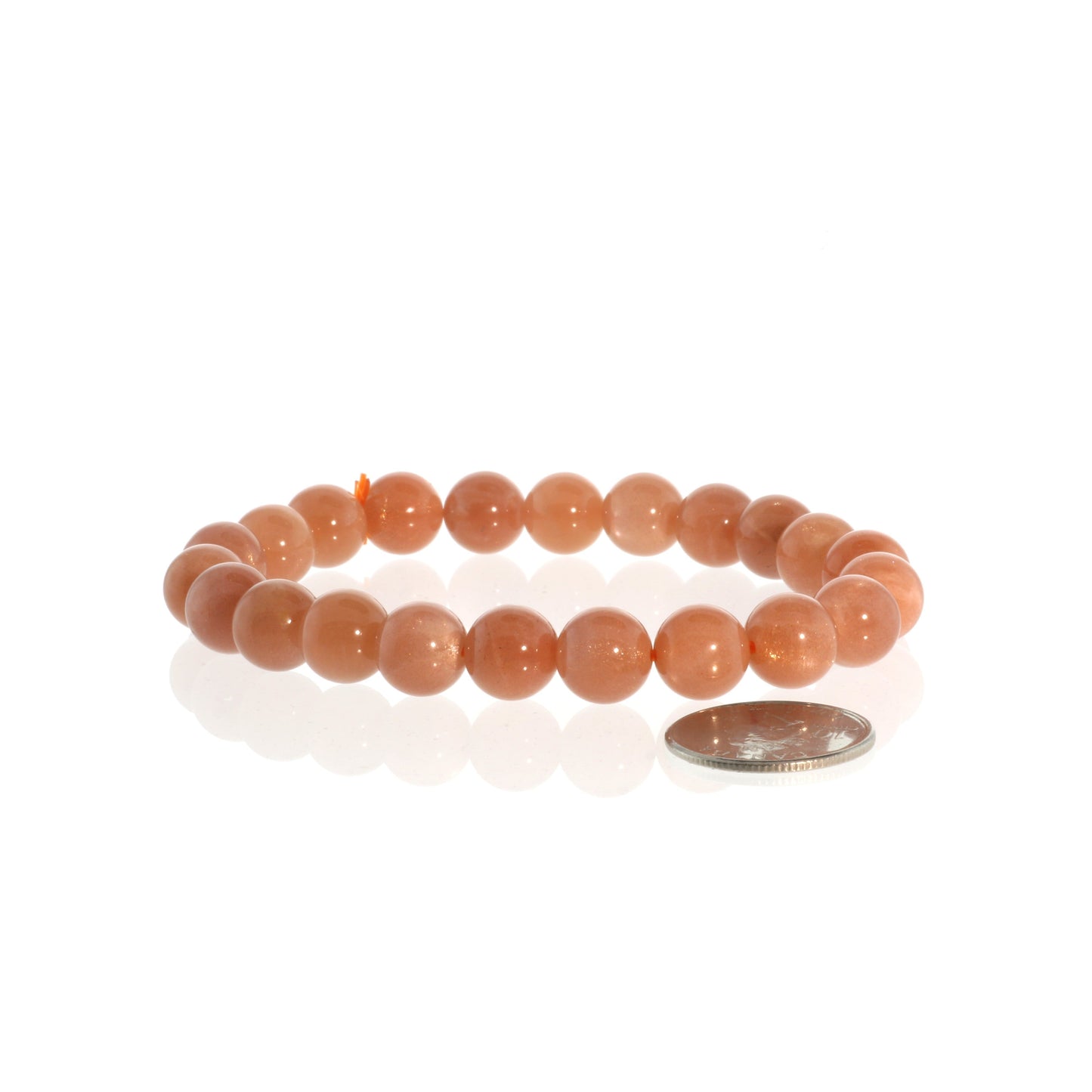Joyful and empowering sunstone round bracelet in warm golden orange