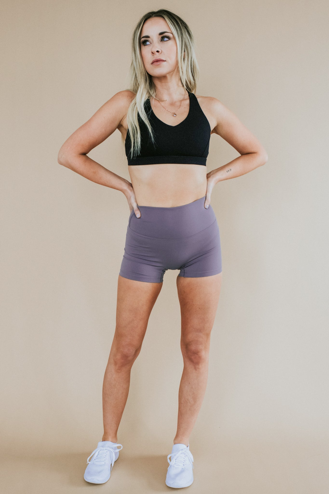 front view of woman wearing barely There 4" yoga shorts in frosted grape, lightweight squat-proof activewear