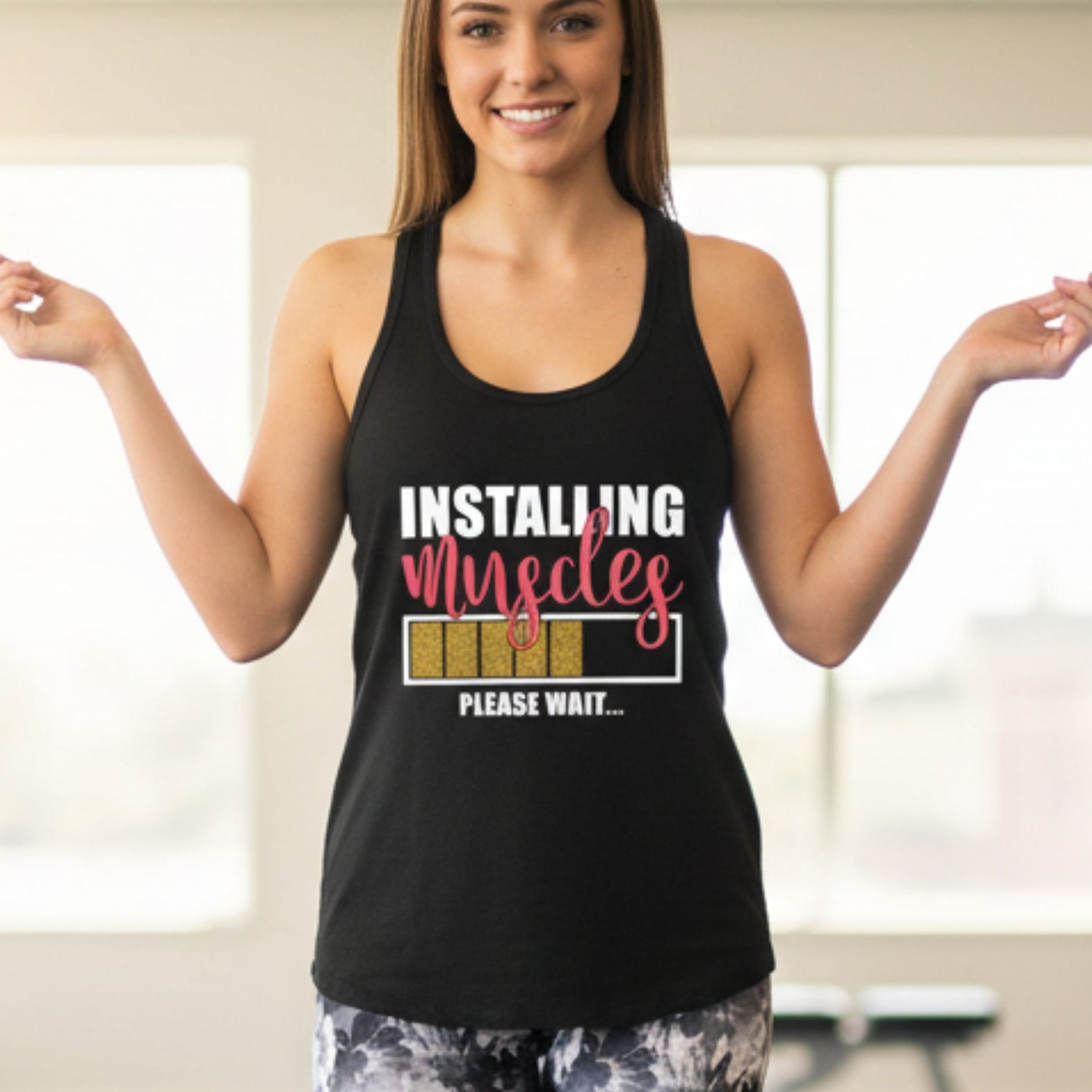 Women's Installing Muscles Please Wait racerback tank — funny gym gift for women who show up and do the work