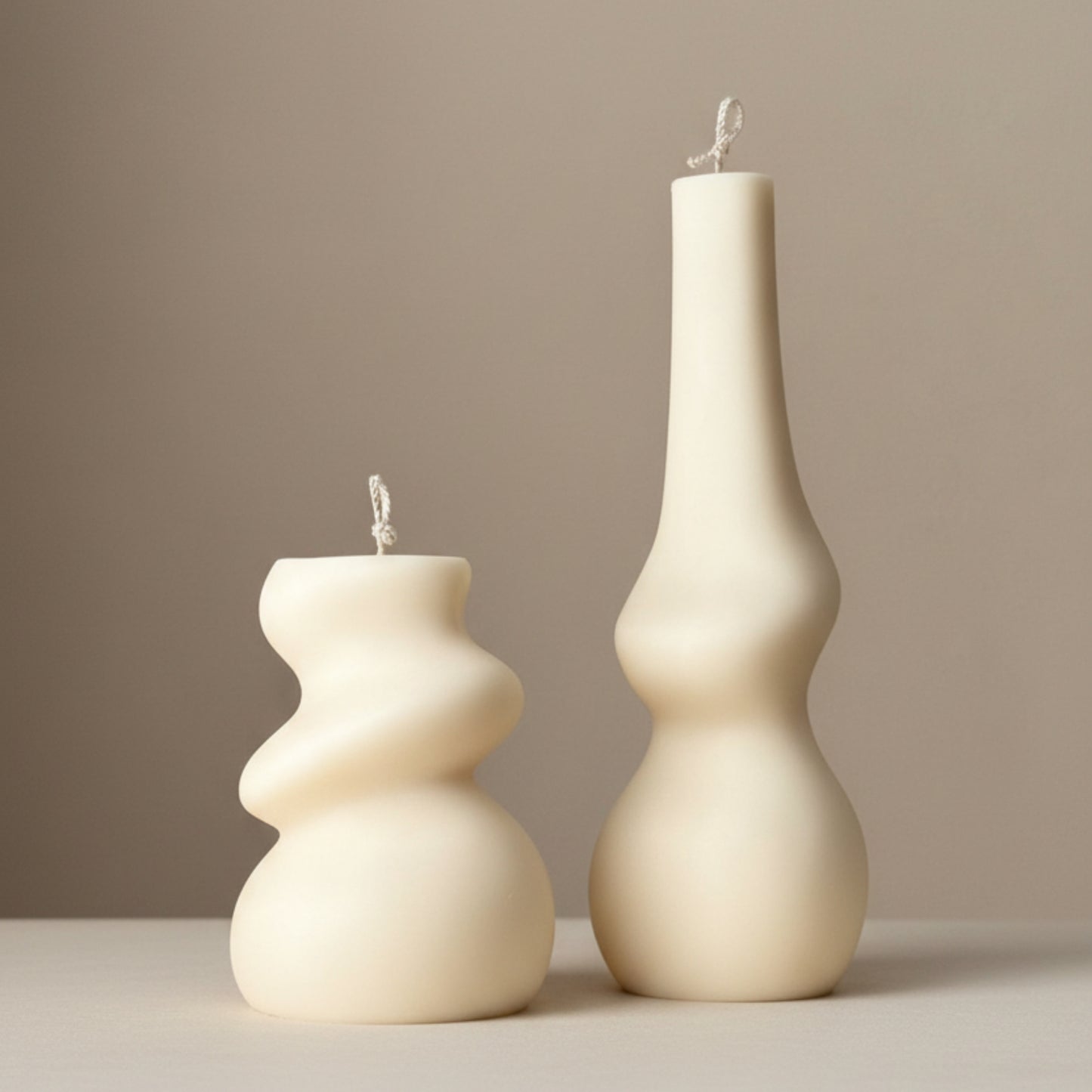 Cream ivory abstract sculptural soy candle set — irregular wavy pillar and tall gourd candle duo, Estelle Studio artisan home décor candle set Canada