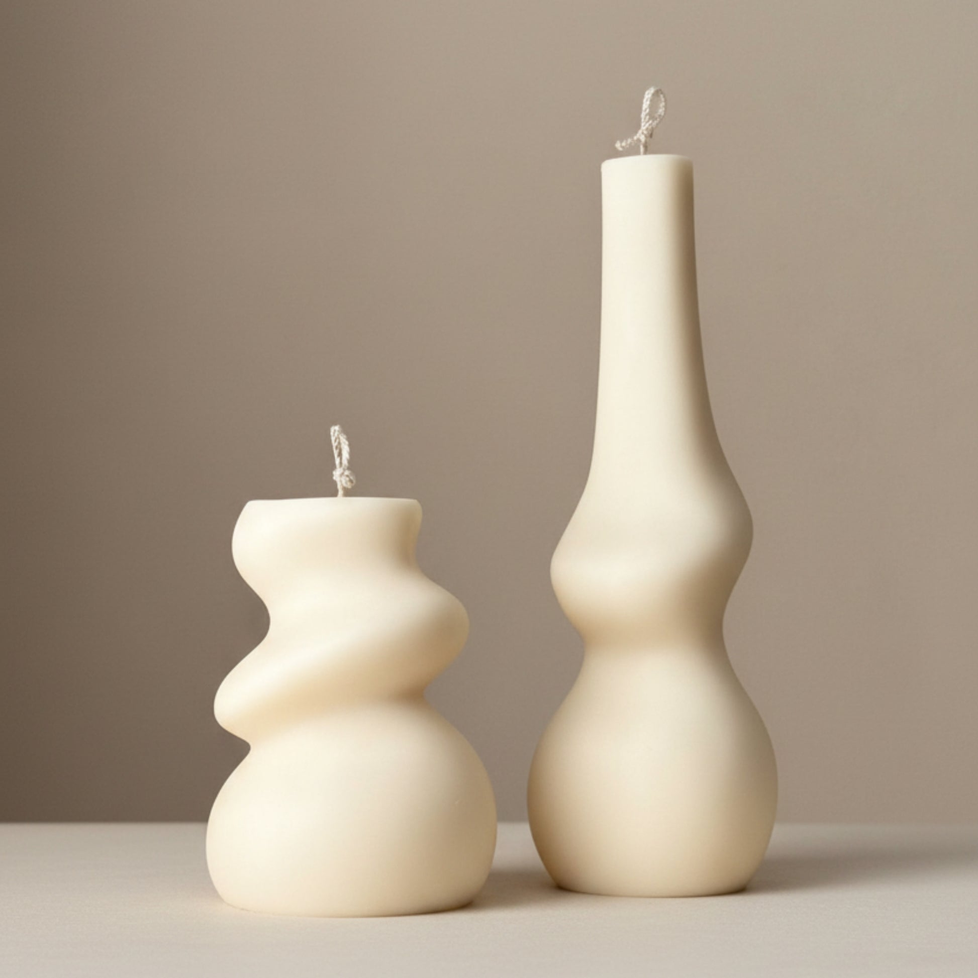 Cream ivory abstract sculptural soy candle set — irregular wavy pillar and tall gourd candle duo, Estelle Studio artisan home décor candle set Canada