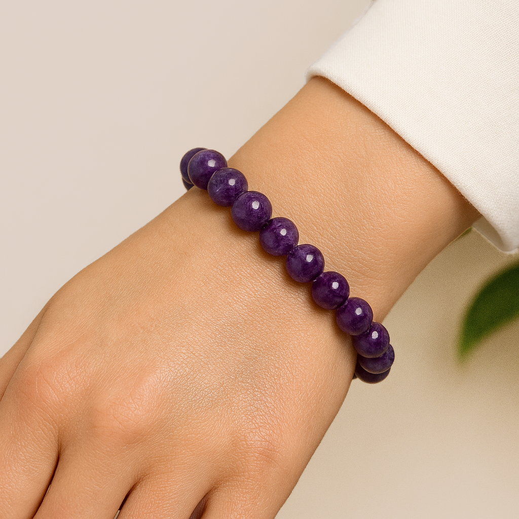 Calming and spiritually protective amethyst bead bracelet in rich purple