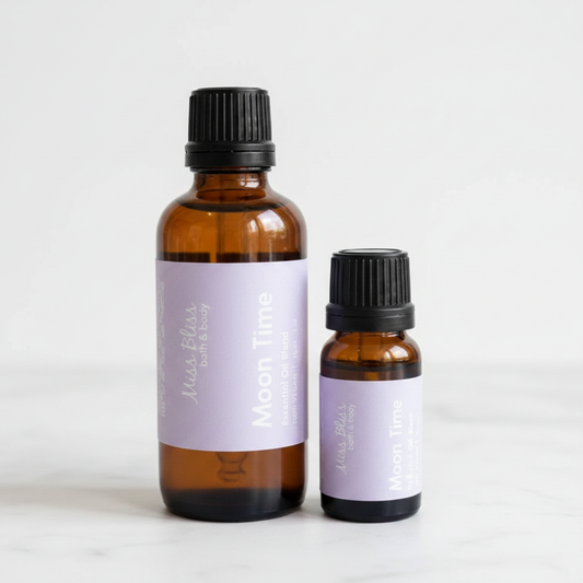 Moon Time Essential Oil Blend — 30ml and 15ml amber glass bottles with purple labels, 100% pure essential oils, handcrafted in Canada