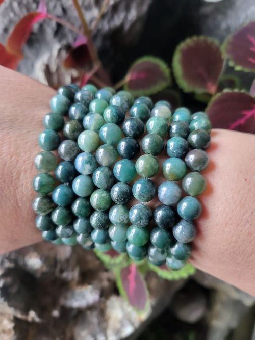 Moss Agate bead bracelet close-up — stone of renewal crystal bracelet handcrafted in Canada