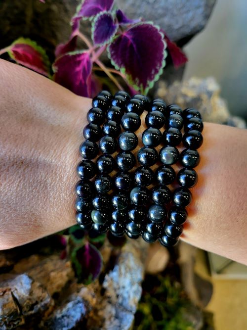 Obsidian bead bracelet close-up — black crystal bracelet for grounding and protection