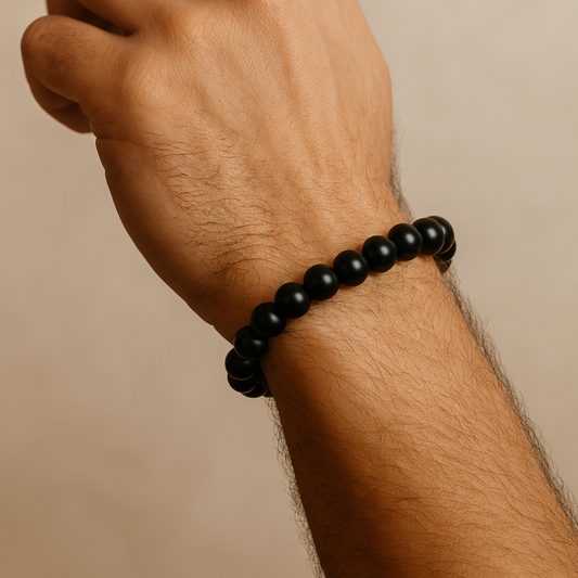 Powerfully protective and grounding onyx bead bracelet in deep black
