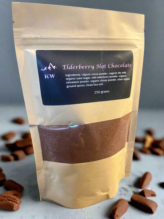 Package of elderberry hot chocolate with a visible label on a gray background