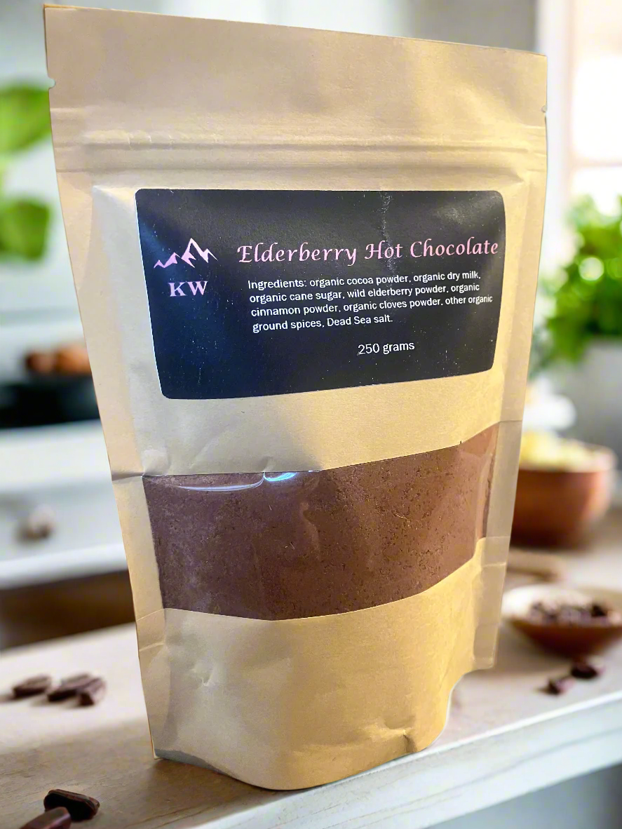 Package of elderberry hot chocolate with a visible label on a blurred background