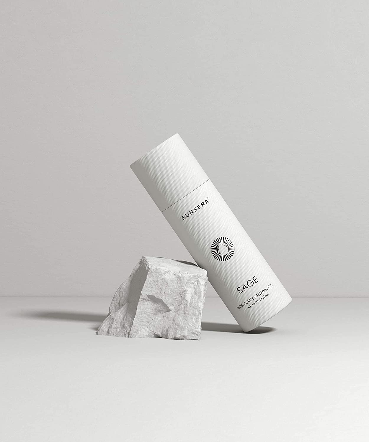 sage essential oil aromatherapy with branding on a light gray background