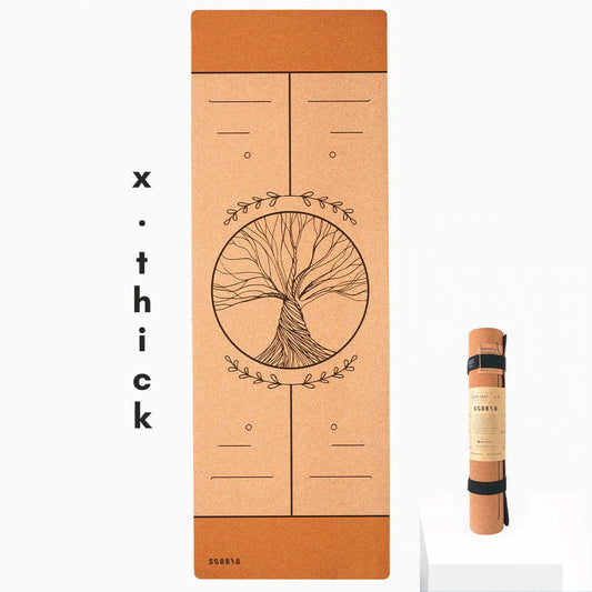 extra thick cork yoga mat with packaging featuring a tree design on a white background