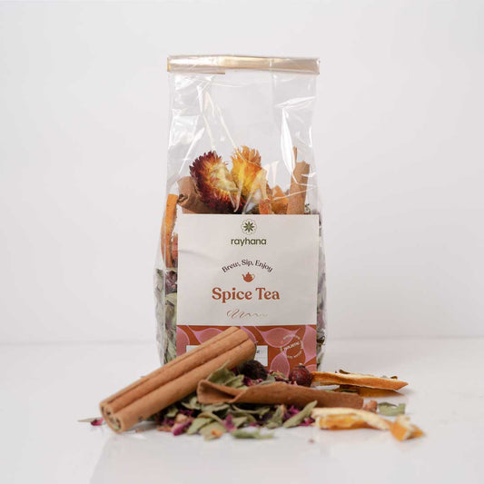 Warming spice herbal tea by Rayhana Organics — aromatic loose leaf blend for digestion and cozy rituals
