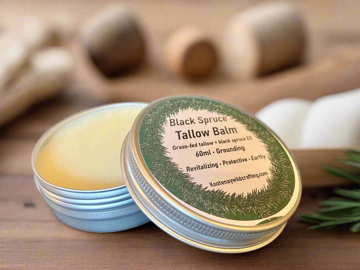 Black Spruce Tallow balm container with label on a wooden surface