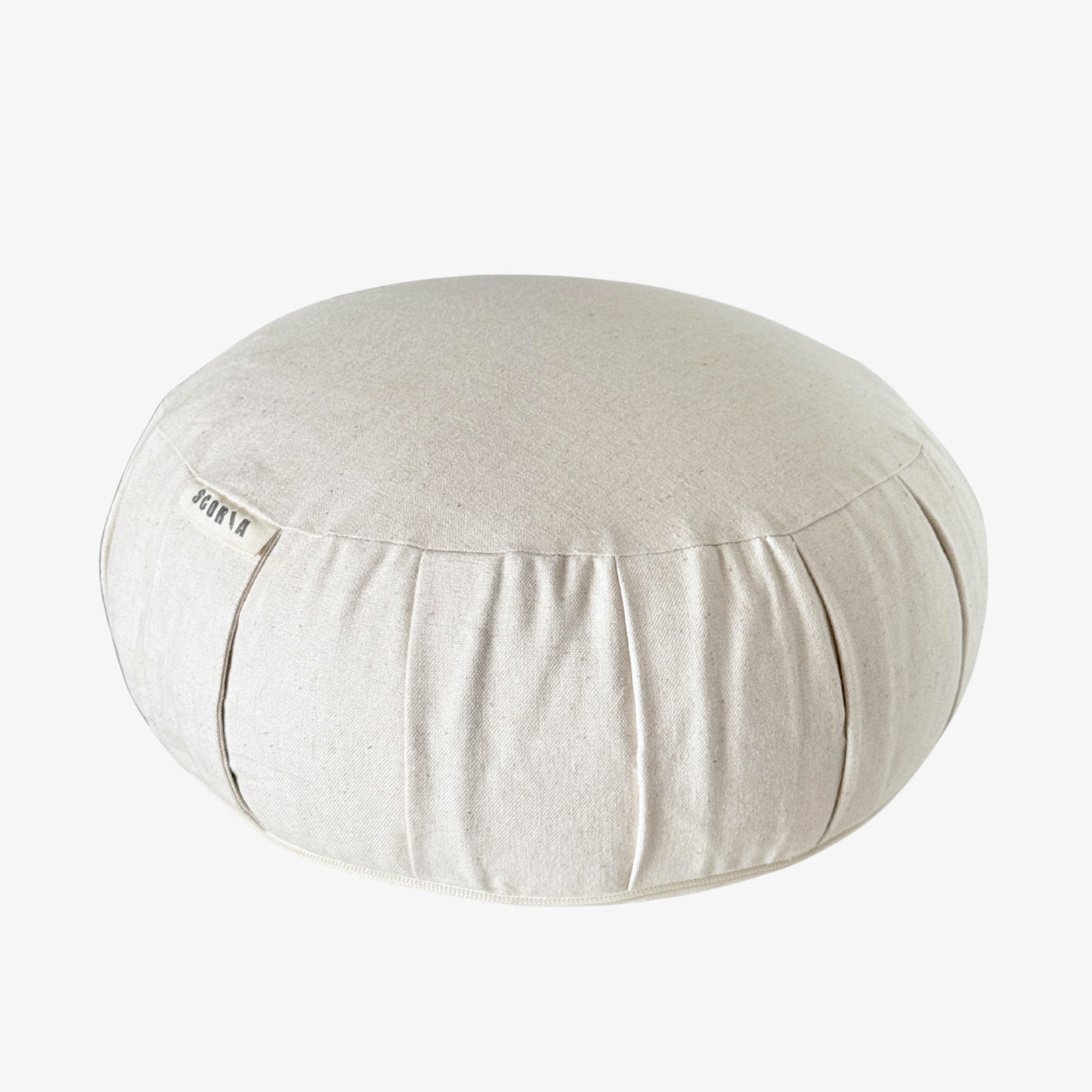 Round beige meditation pillow on a white background